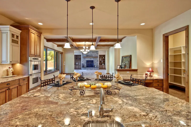 Bear Creek: Kitchen island looking toward the great room
