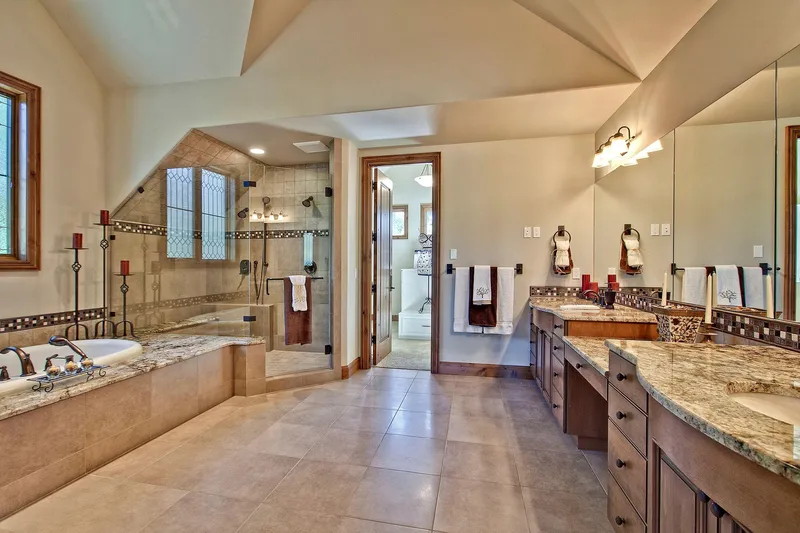 Bear Creek: Bathroom with long vanities and a glass shower