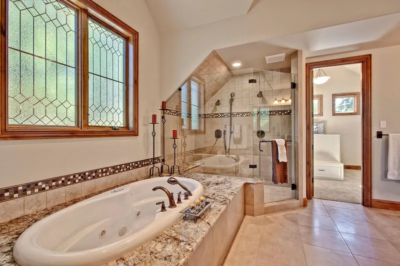 Bear Creek: Bathtub beneath a patterned window