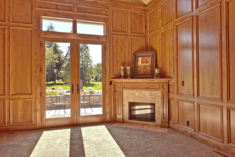 Bear Creek: Paneled study with fireplace and glazed doors