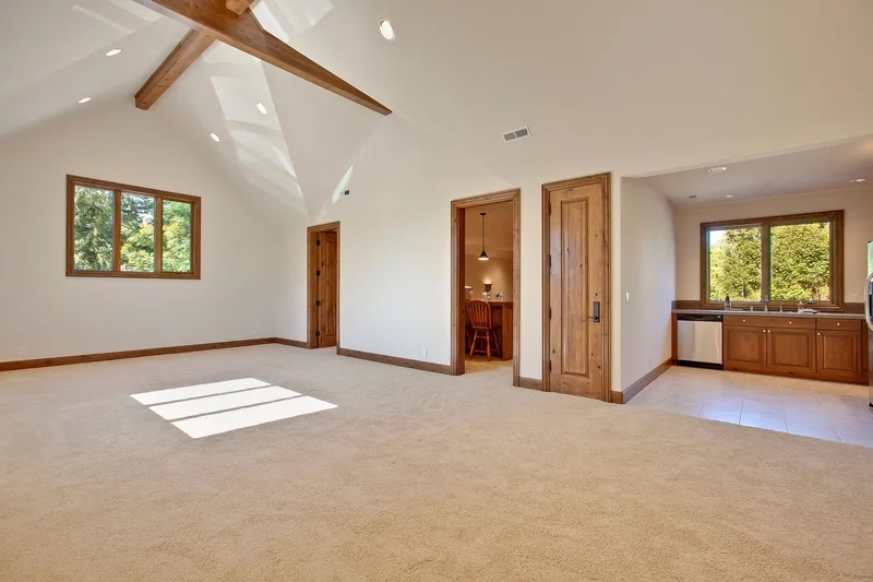Bear Creek: Vaulted room with a ceiling fan and built-in nook
