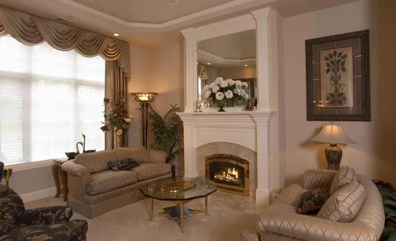 Duvall Valley: Sitting room with a fireplace and tall windows