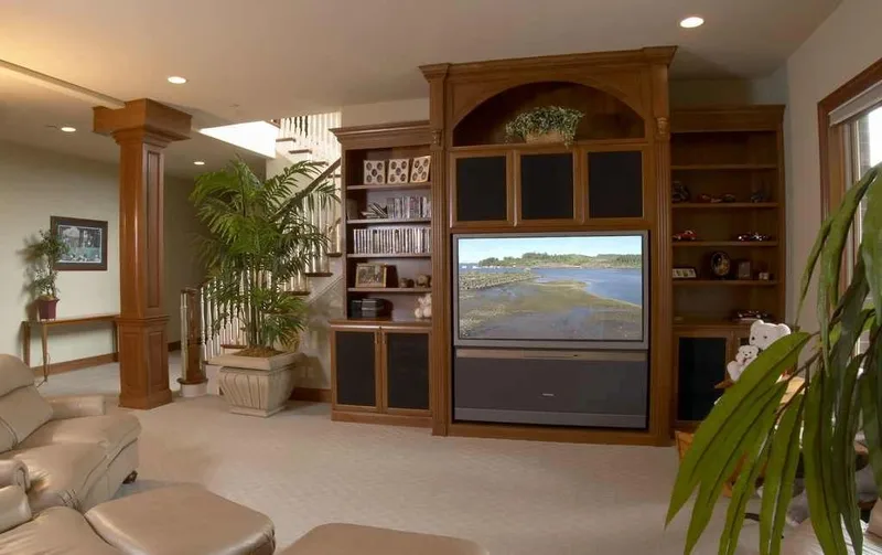 Duvall Valley: Media cabinetry beside an open interior passage
