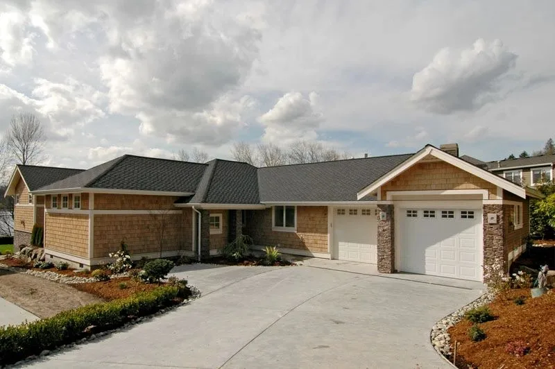 Eagle Shores, Lot 2: Street-side exterior with garage and front approach