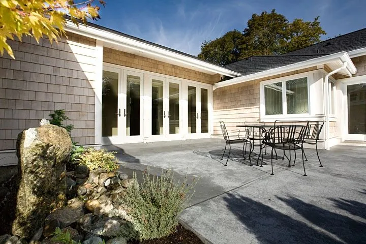 Eagle Shores, Lot 2: Paved patio beside glazed doors