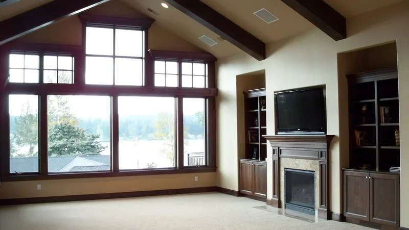 Eagle Shores, Lot 3: Alternate great-room view of windows and fireplace