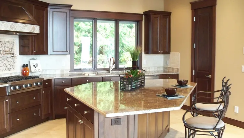 Eagle Shores, Lot 3: Kitchen island beside the window-lined counter