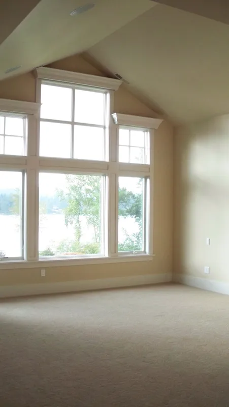 Eagle Shores, Lot 3: Vertical view of the tall window beneath a vaulted ceiling