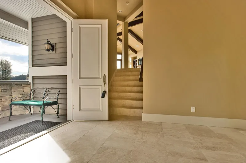 Eagle Shores, Lot 3: Open entry door beside the stairway