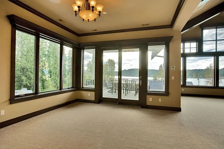 Eagle Shores, Lot 3: Window-lined dining area with deck doors