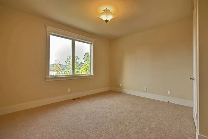 Eagle Shores, Lot 3: Carpeted room with a rectangular window