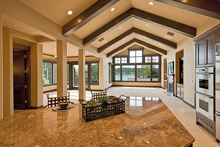 Eagle Shores, Lot 3: Kitchen island looking through the beamed great room