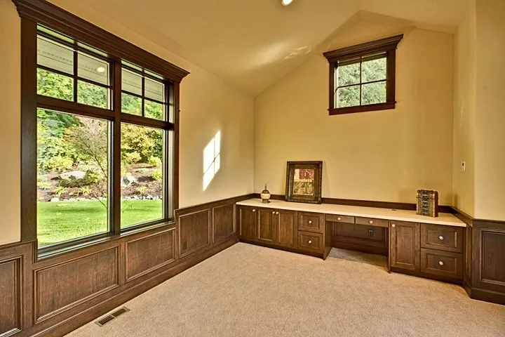 Eagle Shores, Lot 3: Wood-paneled room with built-in cabinetry and a garden window