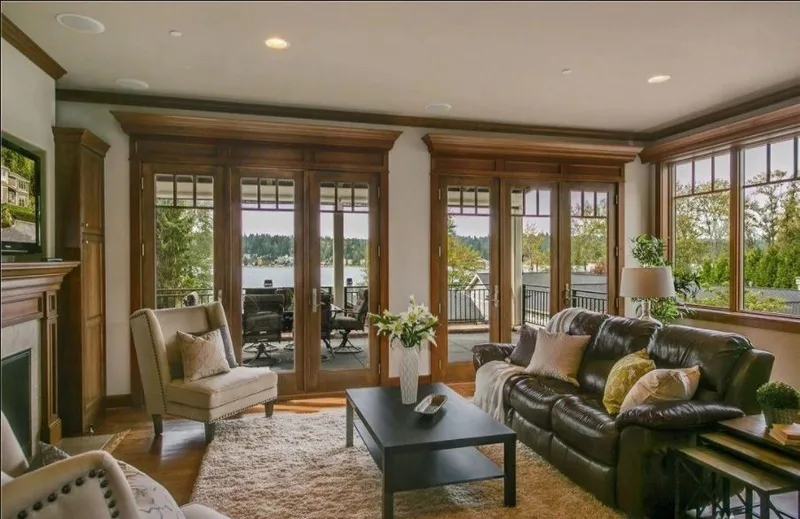 Eagle Shores, Lot 4: Living room with broad windows and lake views