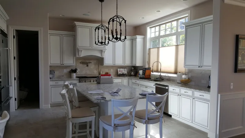Issaquah Highlands: Kitchen and dining area with white cabinetry