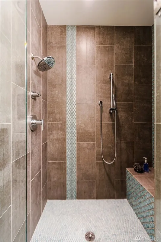 Lake Washington, Madrona: Tiled shower with a built-in bench