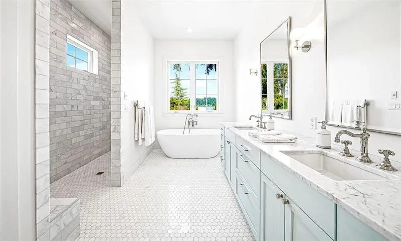 Mercer Island, Cape Cod: Bathroom with a freestanding tub, double vanity and glass shower