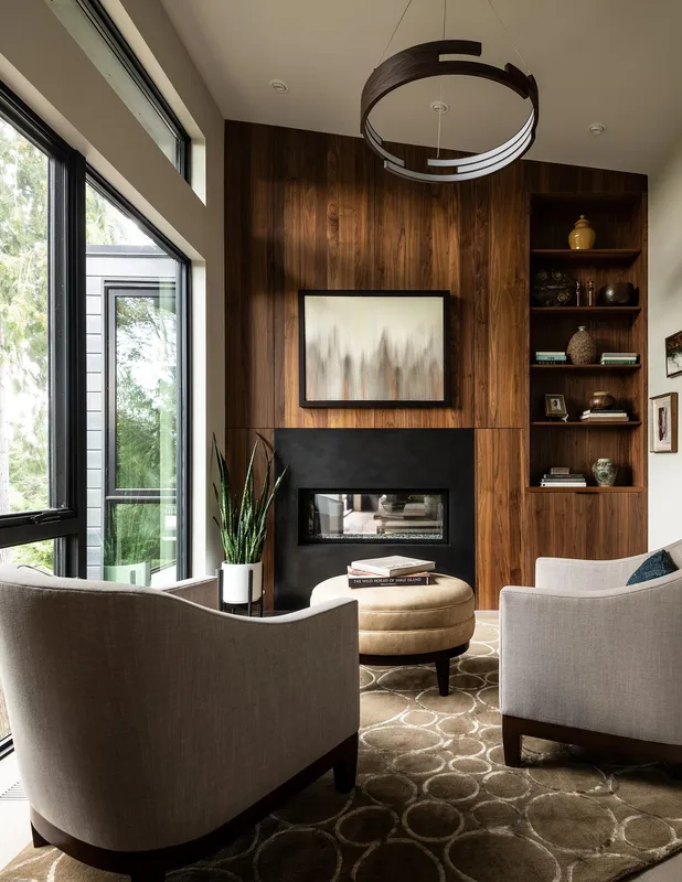 Mercer Island, indoor-outdoor: Wood-paneled sitting corner with built-in shelves