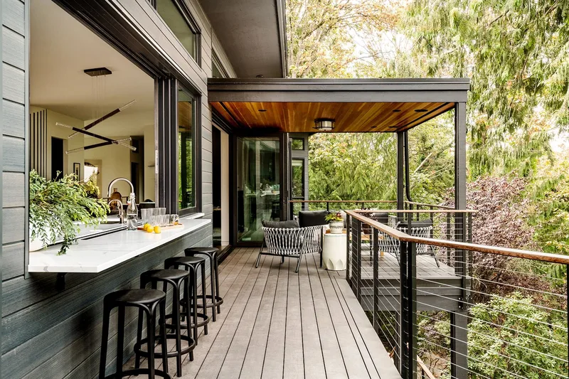 Mercer Island, indoor-outdoor: Kitchen pass-through opening to the covered deck