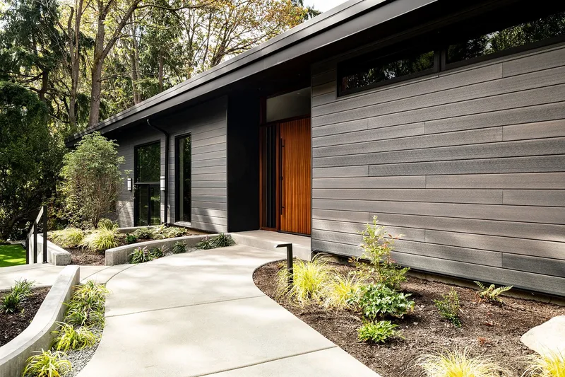 Mercer Island, indoor-outdoor: Entry walkway beside the home's exterior