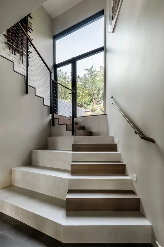 Mercer Island, indoor-outdoor: Staircase beside tall windows
