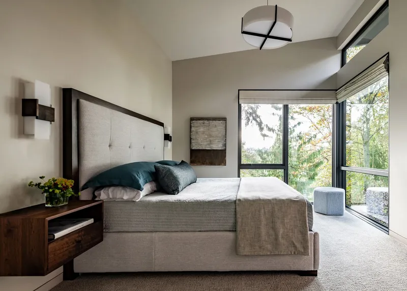 Mercer Island, indoor-outdoor: Bedroom with corner windows facing the trees