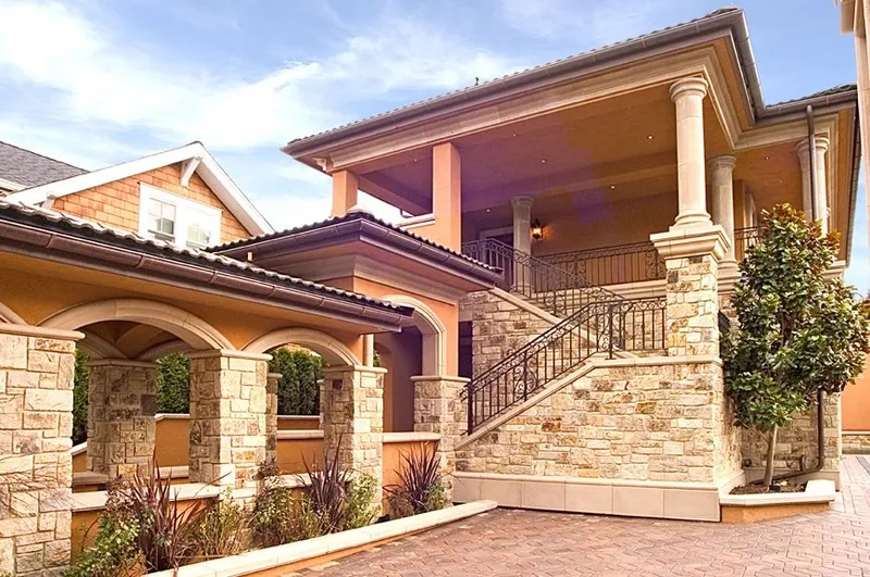 Mercer Island waterfront: Stone steps and columns connecting the courtyard and upper terrace
