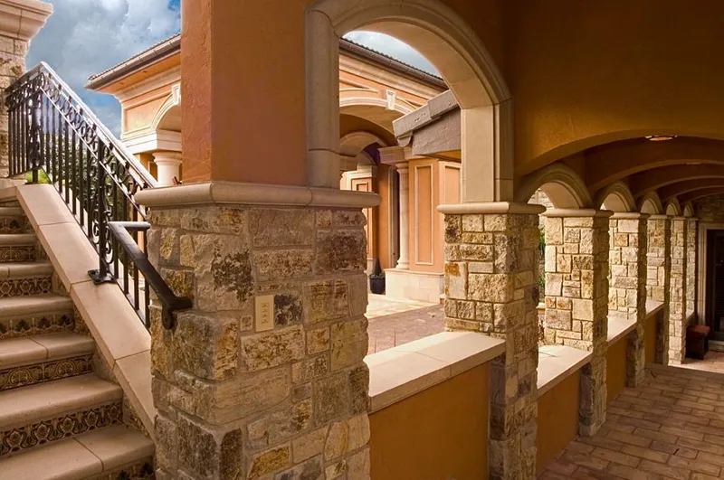 Mercer Island waterfront: Stone columns and arches along the exterior passage