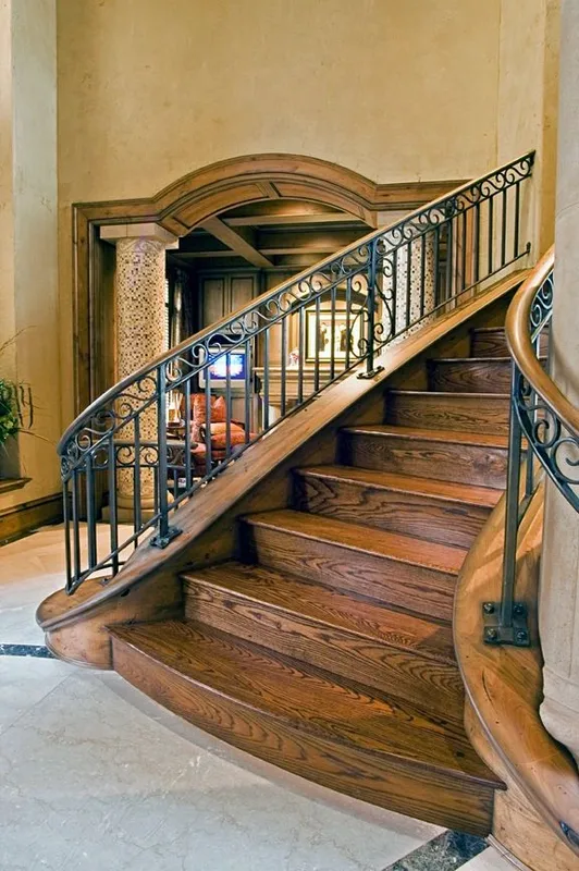 Mercer Island waterfront: Lower staircase and iron railing viewed from the entry floor