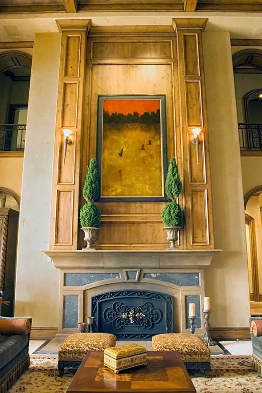 Mercer Island waterfront: Fireplace surround with artwork and decorative columns