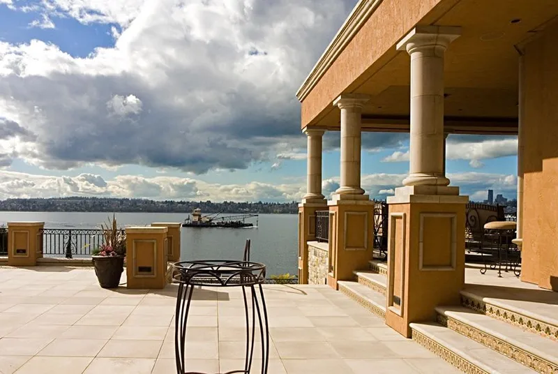 Mercer Island waterfront: Waterfront terrace with the covered lounge beyond