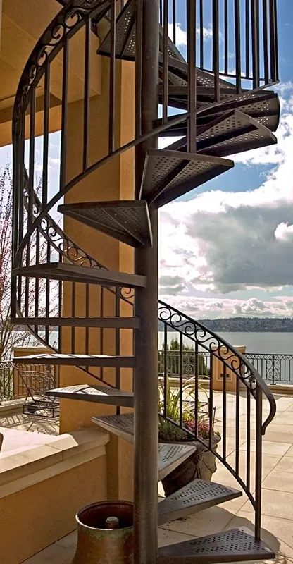 Mercer Island waterfront: Spiral staircase silhouetted against the waterfront