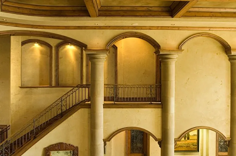 Mercer Island waterfront: Upper gallery with arched openings and iron railings