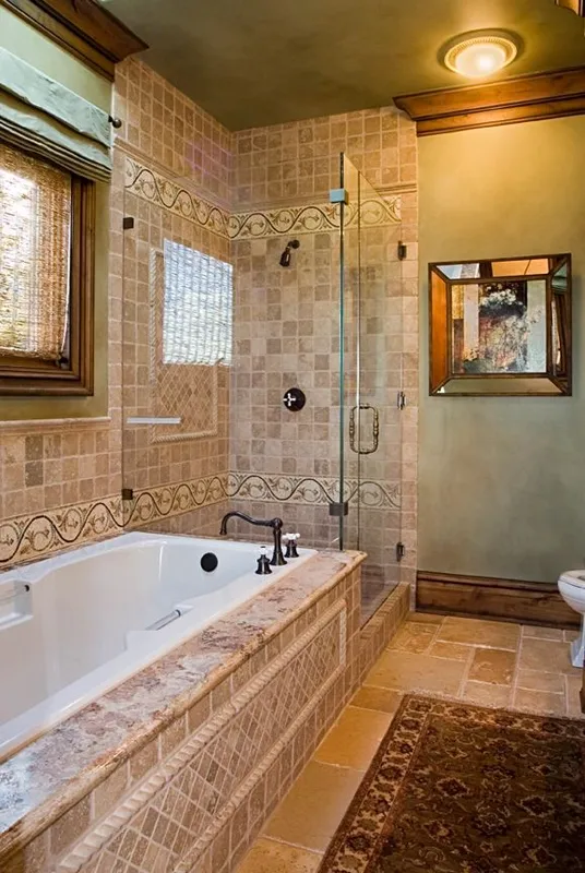 Mercer Island waterfront: Bathroom with a tiled tub surround and glass shower