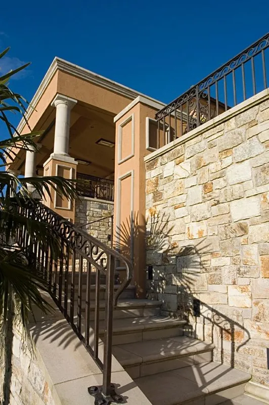 Mercer Island waterfront: Side steps rising beside a stone retaining wall