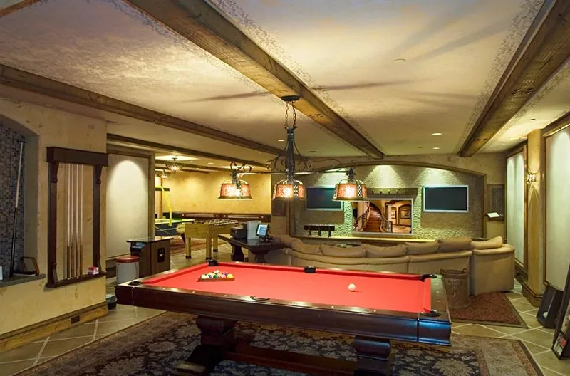 Mercer Island waterfront: Recreation room with a pool table, seating and a wood-beamed ceiling