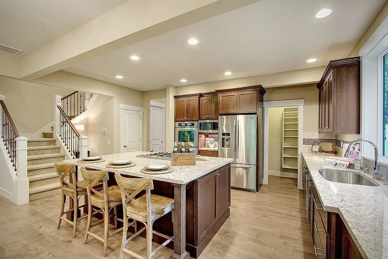Redmond: Kitchen and dining area beside the staircase