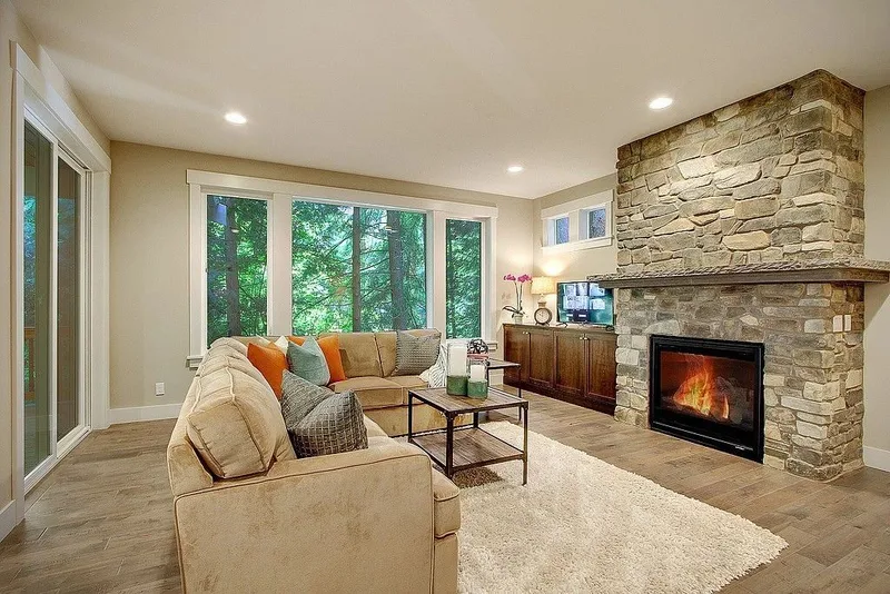 Redmond: Living room with a stone fireplace