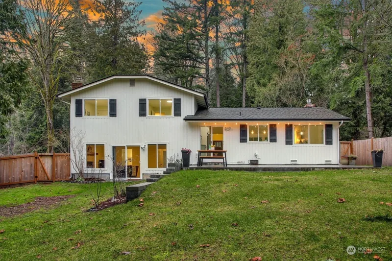 Rear elevation of the home overlooking the lawn
