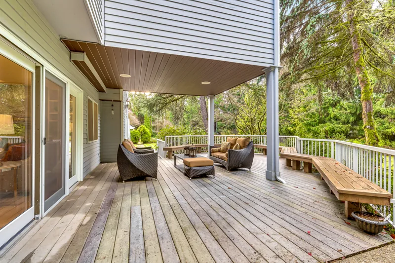 Covered deck facing the wooded garden