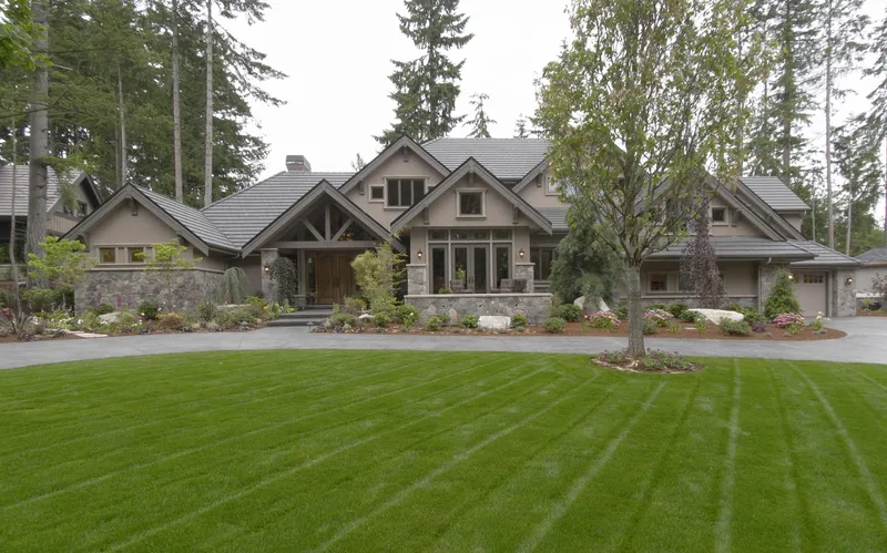 Woodinville Craftsman: Timber-gabled Woodinville home beyond the landscaped front lawn