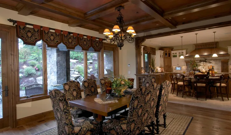 Woodinville Craftsman: Dining room beneath a coffered wood ceiling