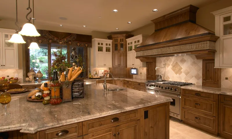 Woodinville Craftsman: Kitchen island beside the decorative range hood