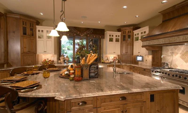Woodinville Craftsman: Kitchen island with a garden-facing sink wall beyond