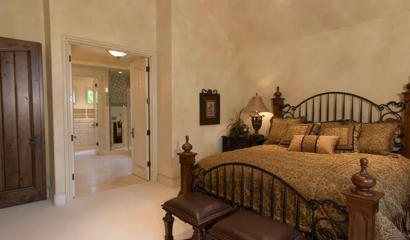 Woodinville Craftsman: Bedroom with an adjoining bathroom doorway