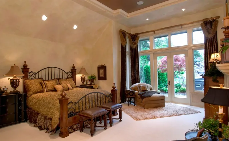 Woodinville Craftsman: Bedroom with tall glass doors opening toward the garden