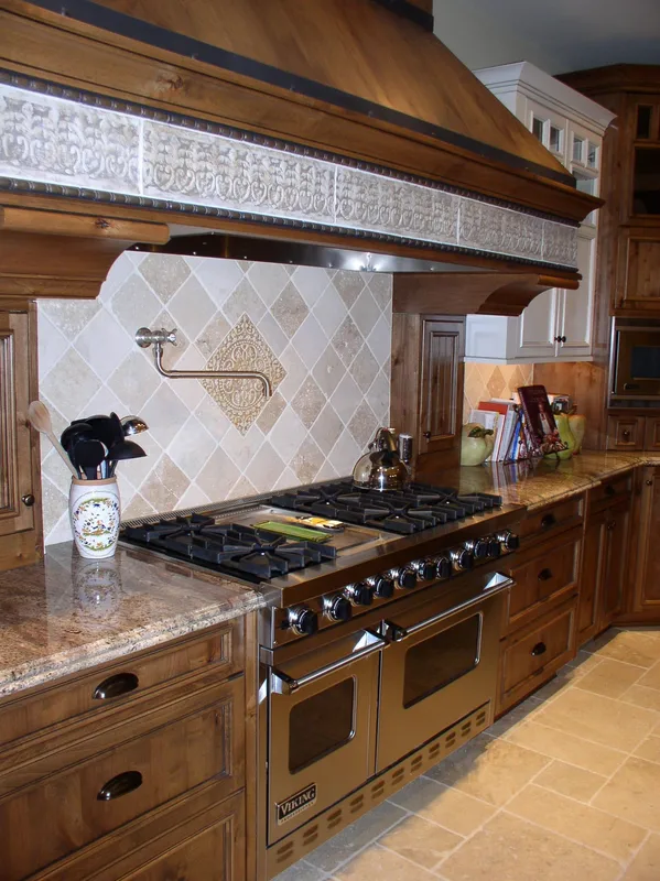 Woodinville Craftsman: Tall view of the kitchen range and decorative hood