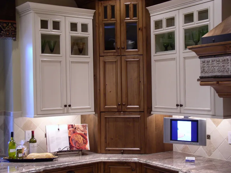 Woodinville Craftsman: Glass-front upper cabinets and decorative kitchen backsplash