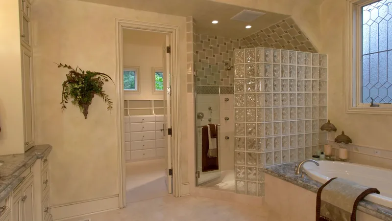 Woodinville Craftsman: Bathroom with a glass-block shower and tub surround