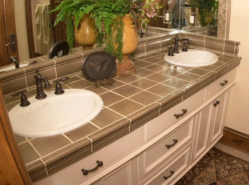 Woodinville Craftsman: Double vanity with tiled counter and white cabinetry